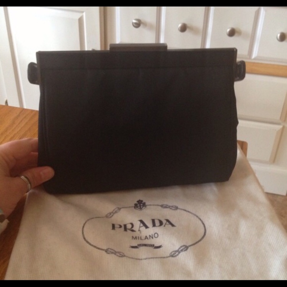 Authentic black Prada purse with dust jacket